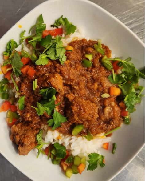 rice and pork dish with tomato sauce