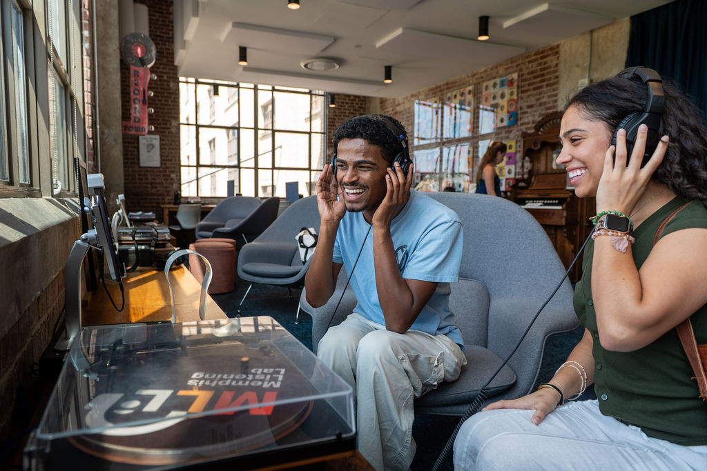 students listen to a record in Memphis Listening Lab